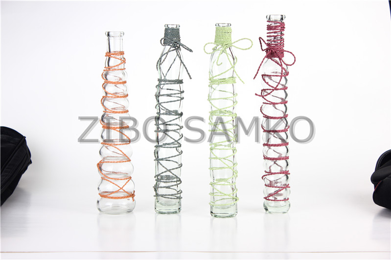 Glass vase with hand draft decor
