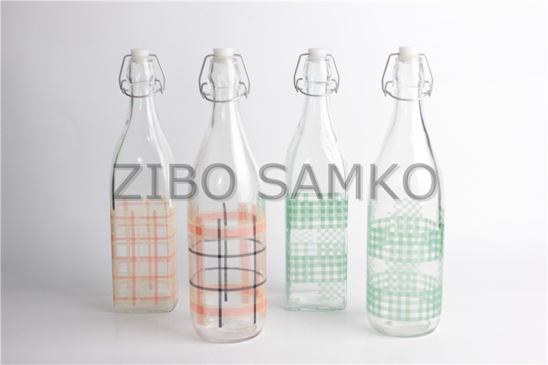 Glass bottle with decal