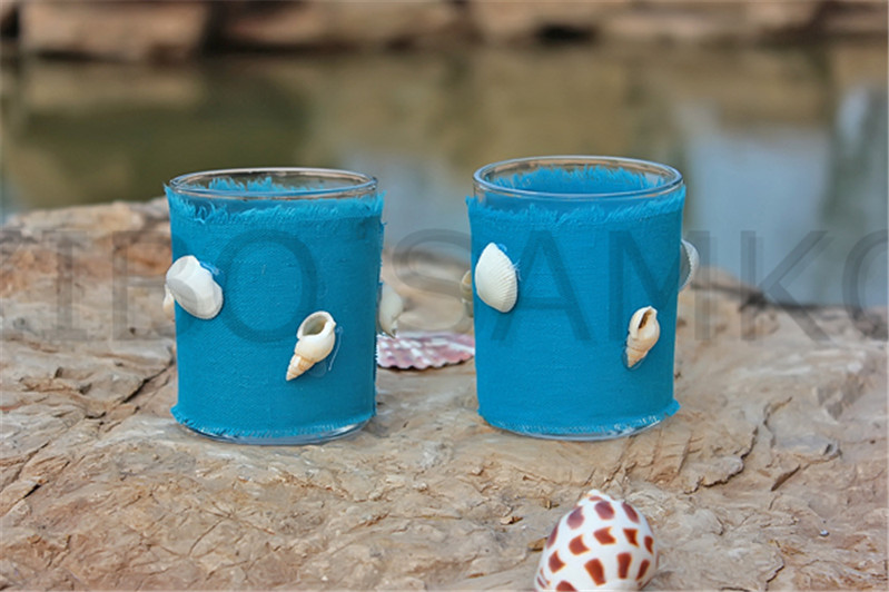 Votive holder with canvas decoration