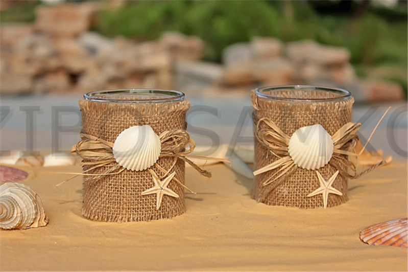 Glass candle holder with canvas decoration