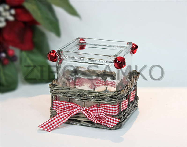 Glass jar with wickered base